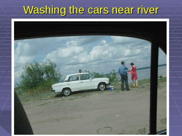 Washing the cars near river